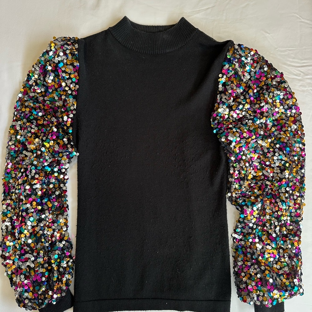 Black sweater with multi colored sequin sleeves size smalll